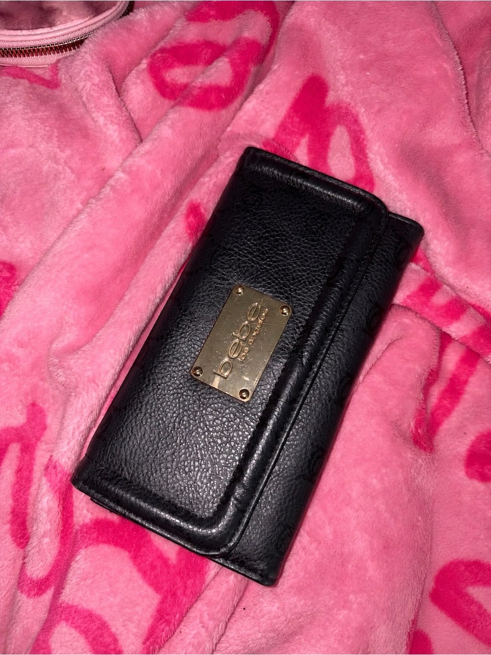 bebe Black Leather Clutch with Gold Plaque